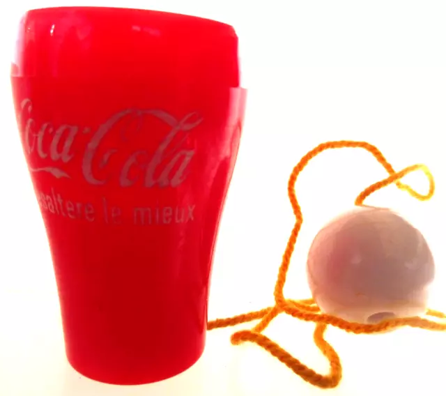 COCA COLA® MINI BILBOQUET "COCA-COLA DESALTERE LE MIEUX"  4 cm H