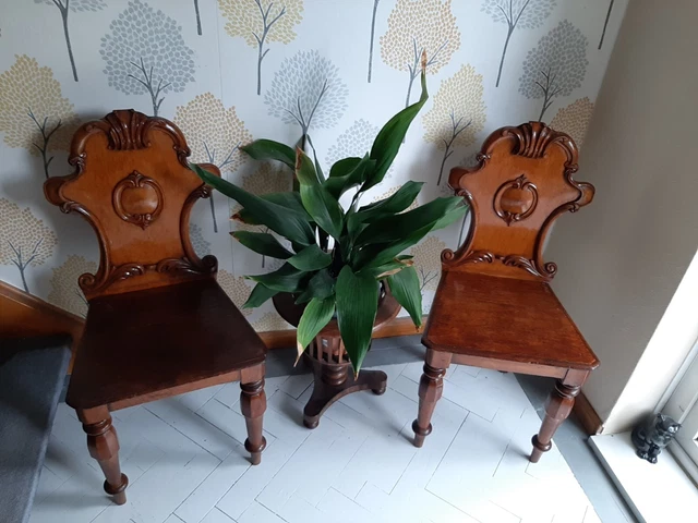 Pair of Victorian oak hall chairs