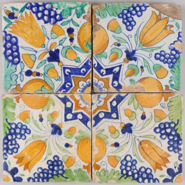 4 Dutch Delft polychrome ornament tiles, early 17th. century.