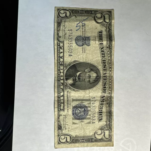 1934 D $ 5.00 Blue seal silver certificate in circulated condition