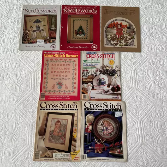 Lot of 7 McCalls Cross Stitch Bazaar Needlewords Cross Stitch & Country Crafts