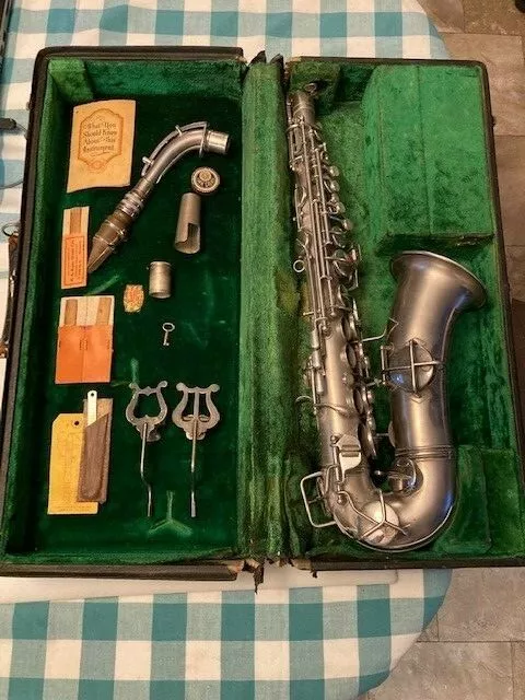Antique C.G. Conn Alto Saxophone w/ Original Locking Case. Silver Antique C.G. Conn Alto Saxophone w/ Original Locking Case. Silver