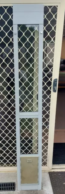 Aluminium and glass patio adjustable height pet door
