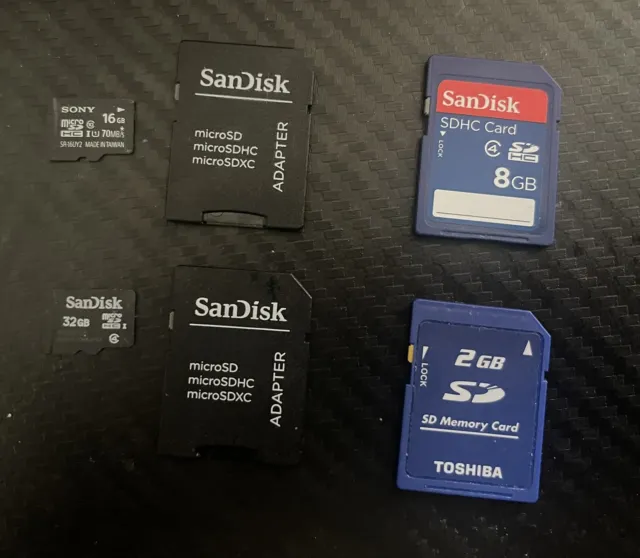 SanDisk 32gb microSDHC Memory Card, Sony  16gb MicroSDHC, SanDisk SDHC 8gb.