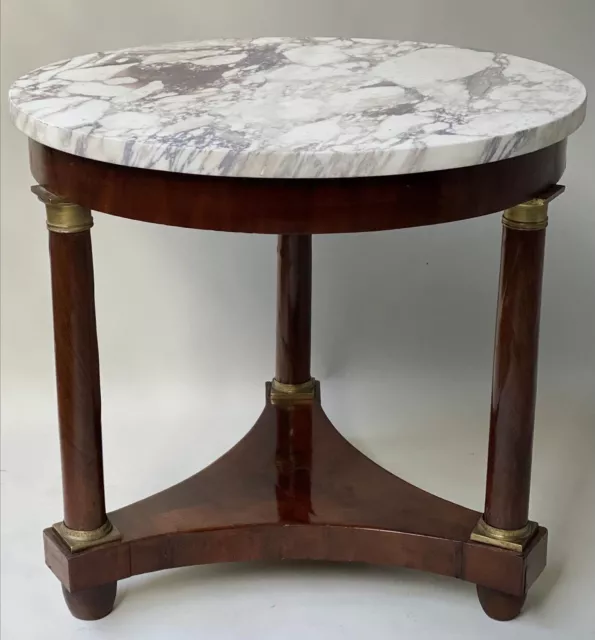 A marvellous Gueridon, French Empire style, early 19th century; marble mahogany