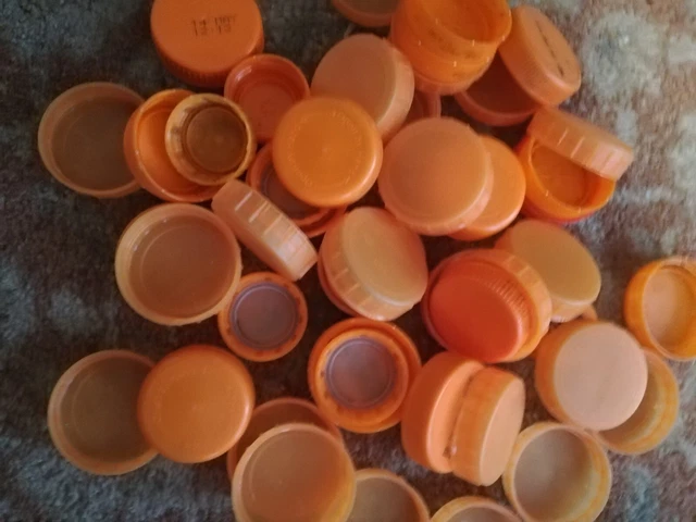 100 camisetas de plástico naranja