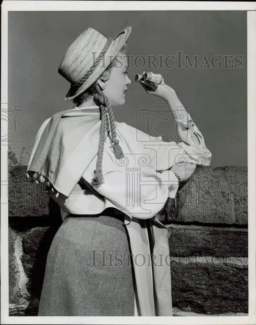 1949 Press Photo Model wearing rope-trimmed straw hat. - nei04223