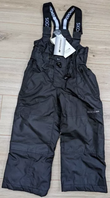 Salopettes ski trousers Skogstad boy girl snowsuit 3-4 y BNWT black