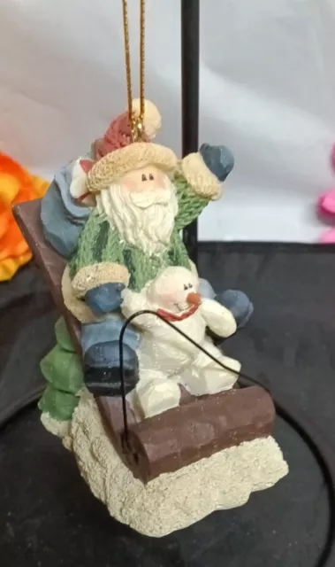 Crazy Mountain Santa Claus and Frosty On Sled Christmas Bag Ornament