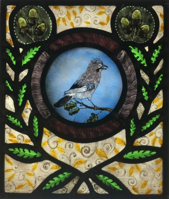 Victorian style stained glass panel with jay bird.