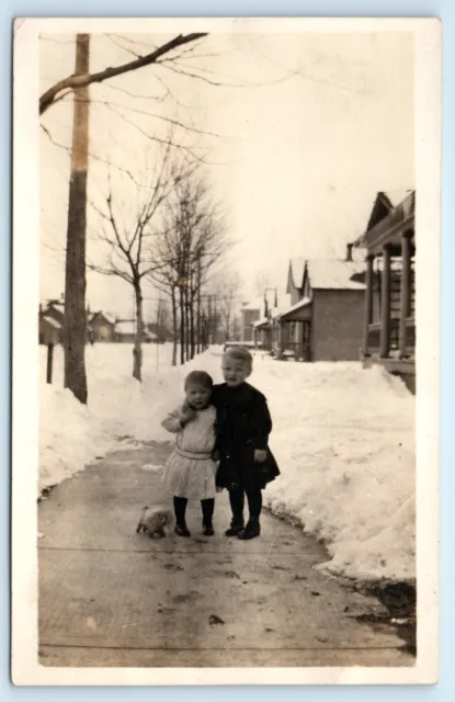 POSTCARD RPPC Holland Michigan 16th Street Bessia and Tom Children Winter Snow
