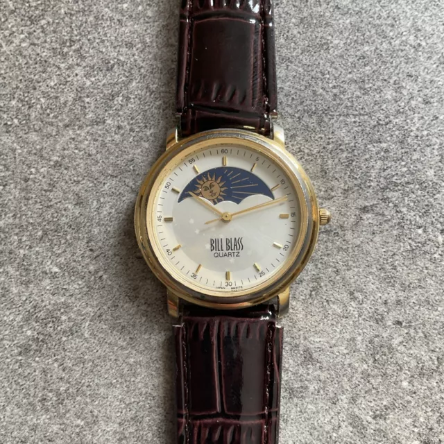 Ladies Bill Blass 32mm Gold Tone Case Moon Phase Watch Brown Leather Band Bin N