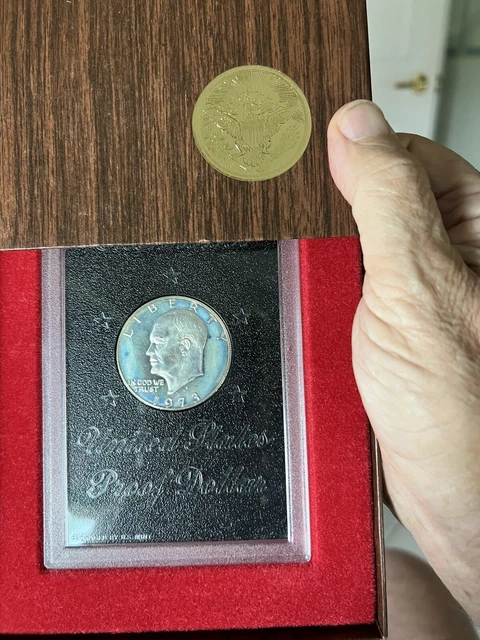 1973-S Eisenhower Ike Dollar Proof in Govt. Brown Box (Beautiful toning) 1973-S Eisenhower Ike Dollar Proof in Govt. Brown Box (Beautiful toning)