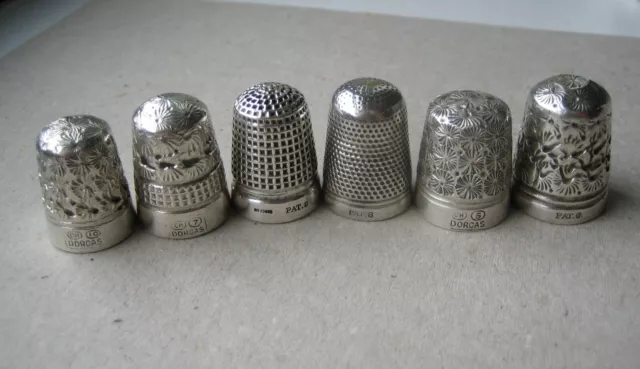 6 Silver Cased on Steel Thimbles. Dorcas & others CH10, CH5, CH7, Pat6 & Pat8