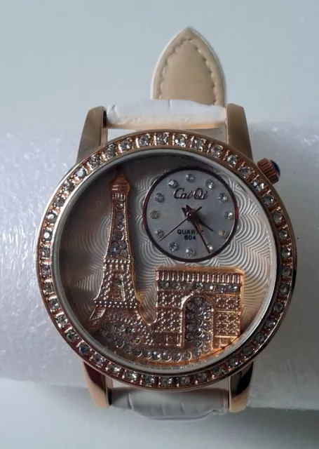 Montre fantaisie femme ou adolescente cadran décoré monuments parisiens & strass