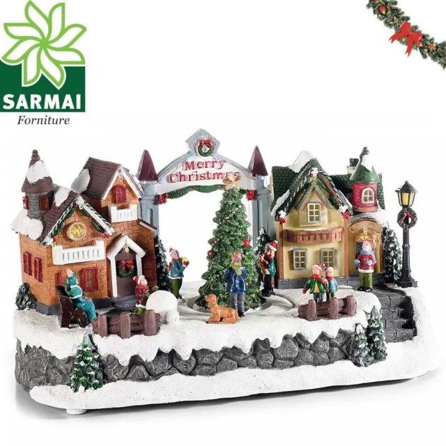 Villaggio di Natale in resina con personaggi rotanti, luci multicolore e musica