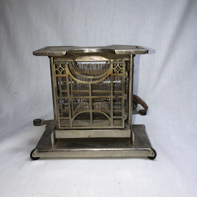 1920s Toaster Universal Landers Frary & Clark Swing Door heats up As It Should 1920s Toaster Universal Landers Frary & Clark Swing Door heats up As It Should