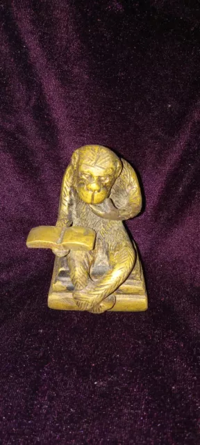 Cast Iron Monkey Reading Book