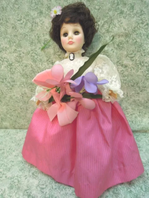 LC-1589 EFFANBEE vinyl doll-12" tall; dressed in pink skirt and white blouse