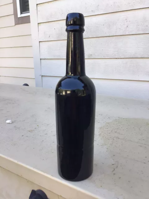 1860-70s Black Glass Turn Mold Ale bottle H-10 1/4in. Dia-2 1/2in.Clean Bottle. 1860-70s Black Glass Turn Mold Ale bottle H-10 1/4in. Dia-2 1/2in.Clean Bottle.