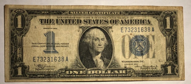 1934 $1 Funnyback blue seal silver certificate FR1606. F-VF  #ud2