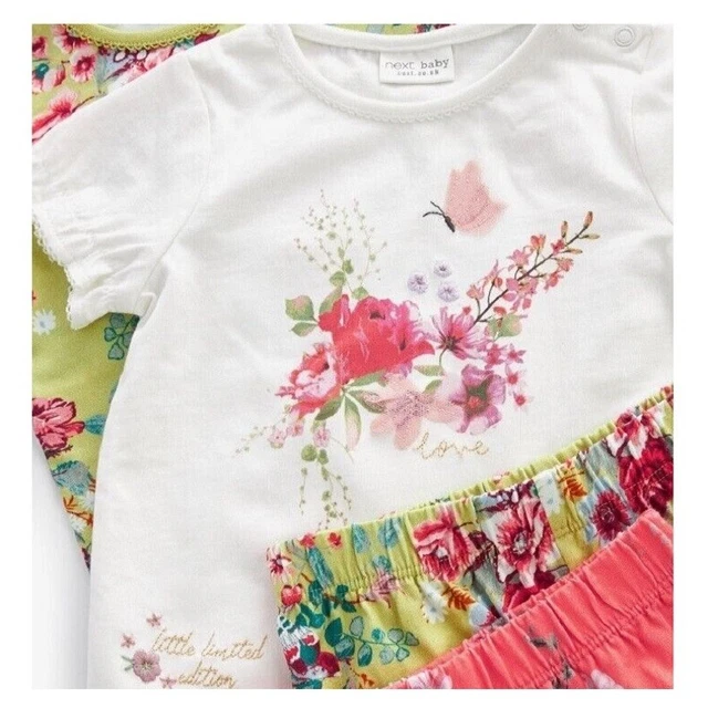 Set T-shirt e pantaloncini per bambine NEXT età 9 12 mesi abito estivo confezione da 4 NUOVI