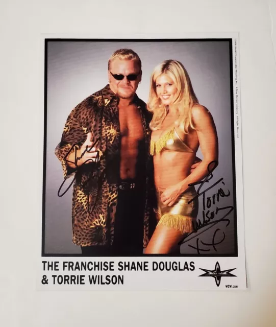 The Franchise Shane Douglas and  Torrie Wilson WCW Duel Signed 8x10.