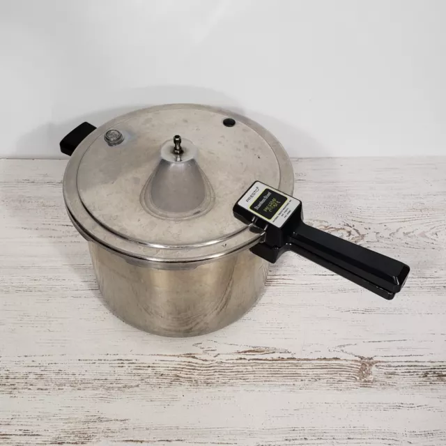 https://www.picclickimg.com/R44AAOSwTnNlUYFn/Vintage-Presto-stainless-steel-pressure-cooker-model-0135004.webp