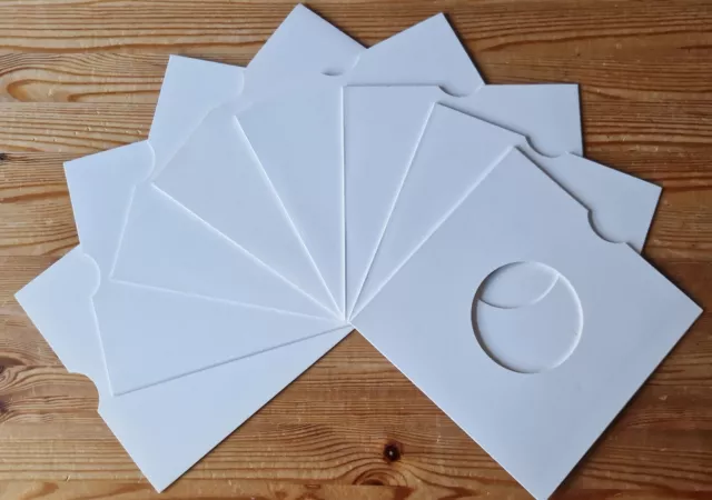 10 x 45/7" WHITE CARDBOARD RECORD SLEEVES (Used But In Excellent Condition)
