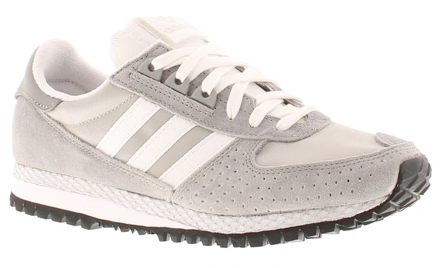 Grey adidas hotsell junior trainers
