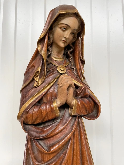 An Exceptional French Gothic Revival praying Madonna carved in wood circa 1880