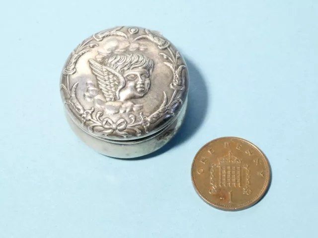 1902 Sterling Silver Pill / Trinket Box with Cherub Cupid Bust Repousse Lid