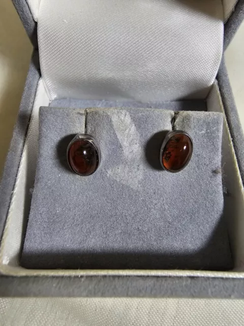 Hermosos pendientes de plata esterlina y ámbar