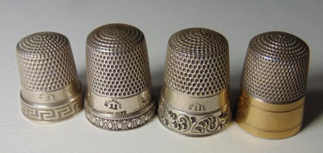 Lot of 4 Simons Bros Sterling Silver Thimbles, sizes: 8, 11, 11, 11 (gold band)