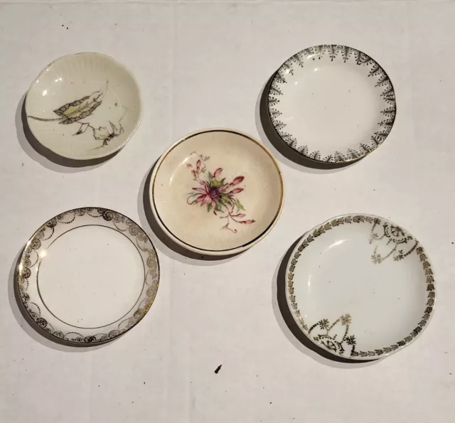 5 Antique Porcelain/ Ironstone Butter Pats. Various Designs. NR