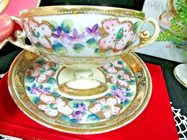 Nippon tea cup and saucer painted double handle teacup blossoms Japan 1920s