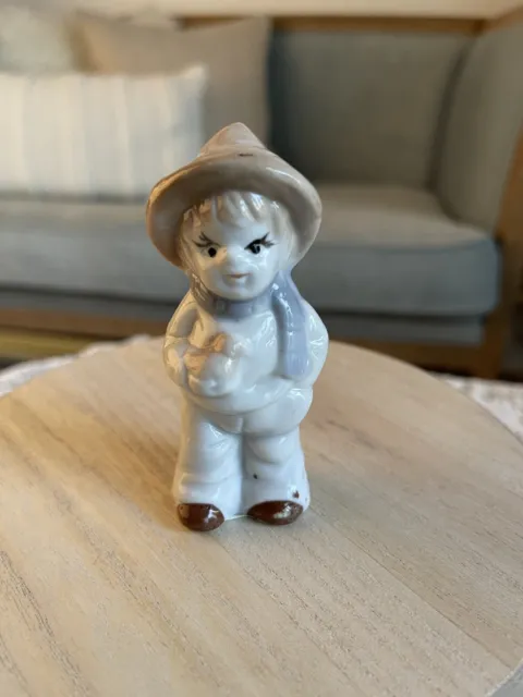 Vintage Porcelain Hand Painted Boy Figurine  W/ Brown Hat & Scarf Holding Bird