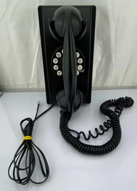 Teléfono de montaje en pared negro con botón pulsador estilo vintage modelo CR55.