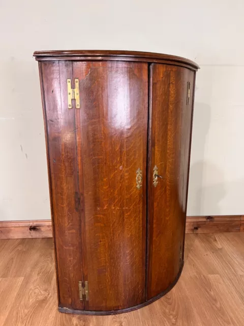 Georgian Inlaid oak Bow fronted Corner Cupboard circa 1800