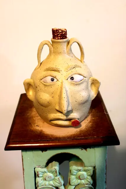 wayne hewell  face jug, pottery, folk art  9''x 7''