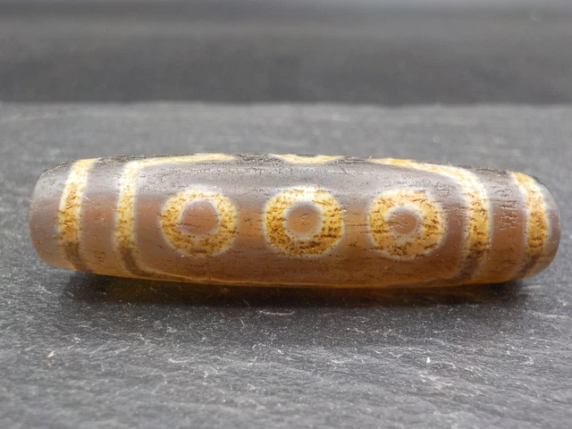 An Agate Dzi bead with a 7 Eye pattern from Tibet / Nepal.
