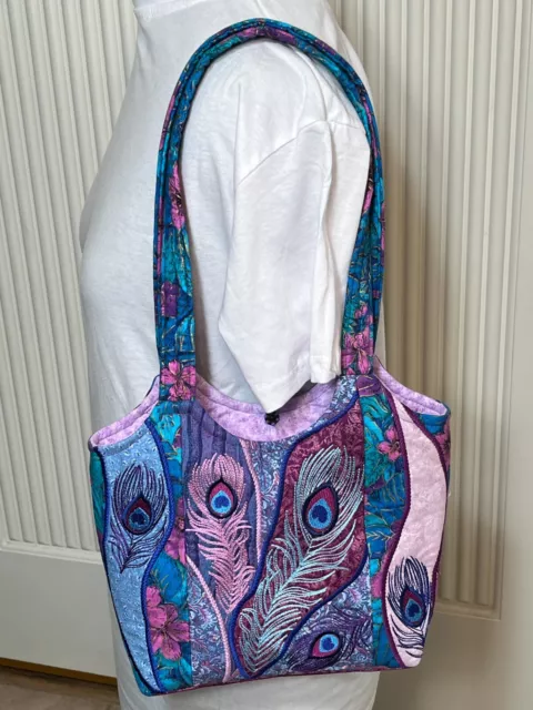 Purse of embroidered Peacock feathers of beautifully colored lightweight fabric