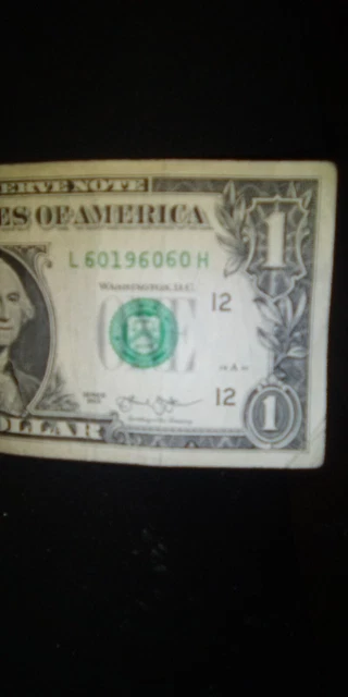 fancy serial number 1 dollar bill