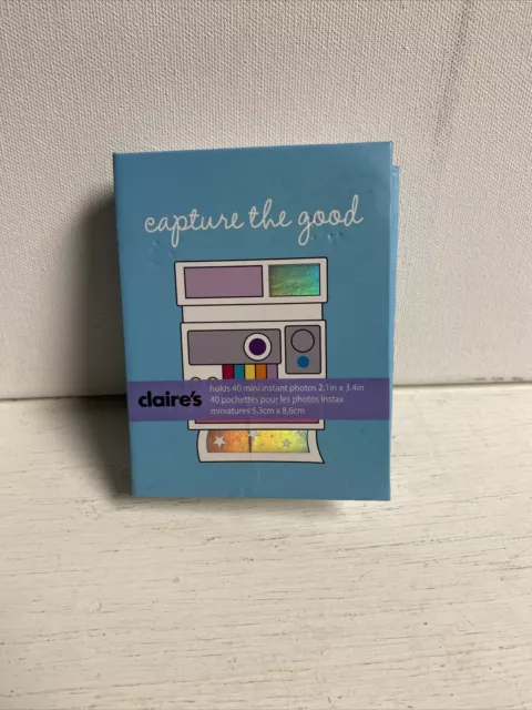 Mini álbum de fotos con cámara instantánea de la marca Claires nuevo con etiquetas
