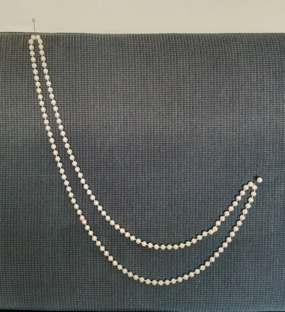 Elegante locker aufgefädelte, lange Perlenkette, Cremefarben, ca 65cm