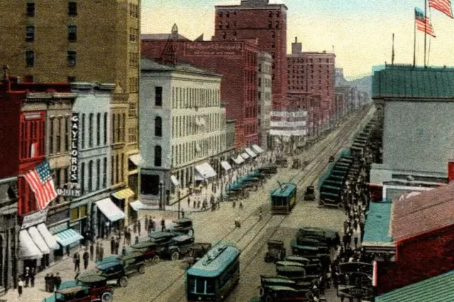 State Street Erie PA Trolley Gaylords Aerial US Flag c1920 Autos WB postcard P10