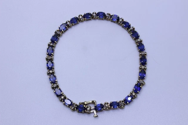 10K Yellow Gold Plated Silver Lab Created Oval Sapphire Tennis Clasp Bracelet7.5 10K Yellow Gold Plated Silver Lab Created Oval Sapphire Tennis Clasp Bracelet7.5