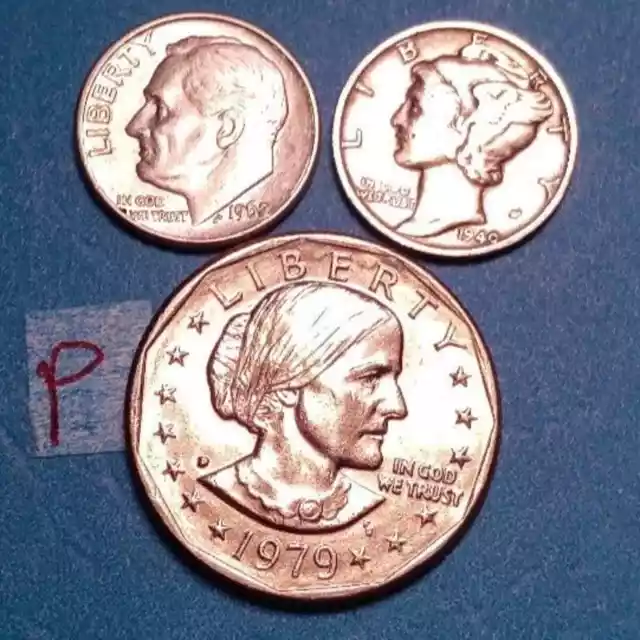 One Susan B. Anthony Dollar, one Roosevelt Dimes, & one Mercury Dime.