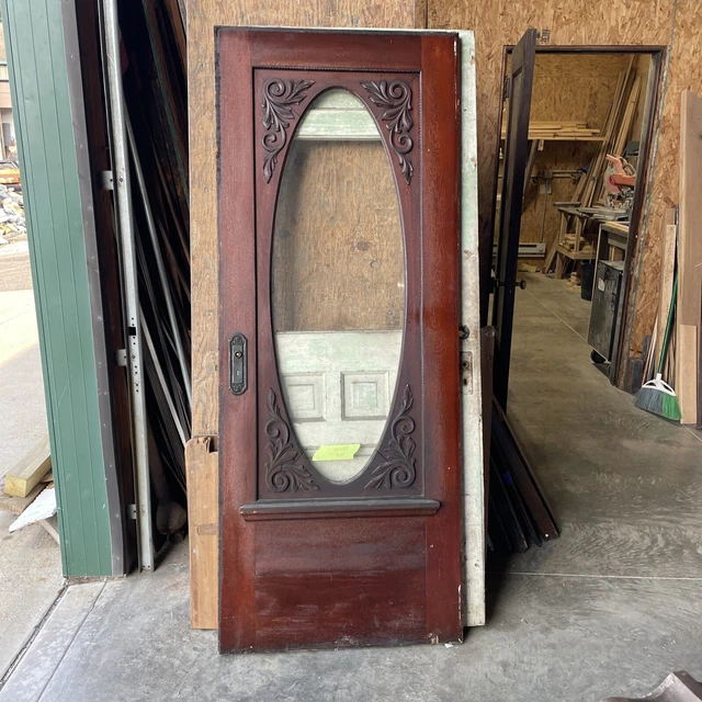 AN 708 antique Beveled oval glass entrance door 31 5/8 by 79.75 X1 3/8”