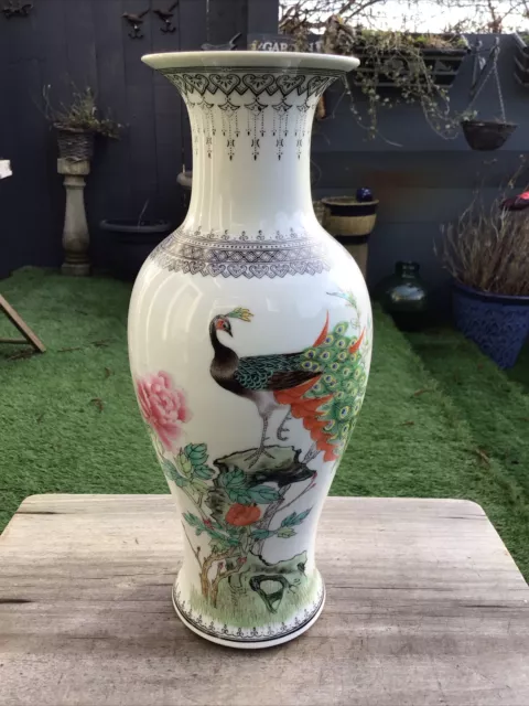 CHINESE PORCELAIN VASE DECORATED WITH PEACOCKS 30cm HIGH RED MAKERS MARK ON BASE